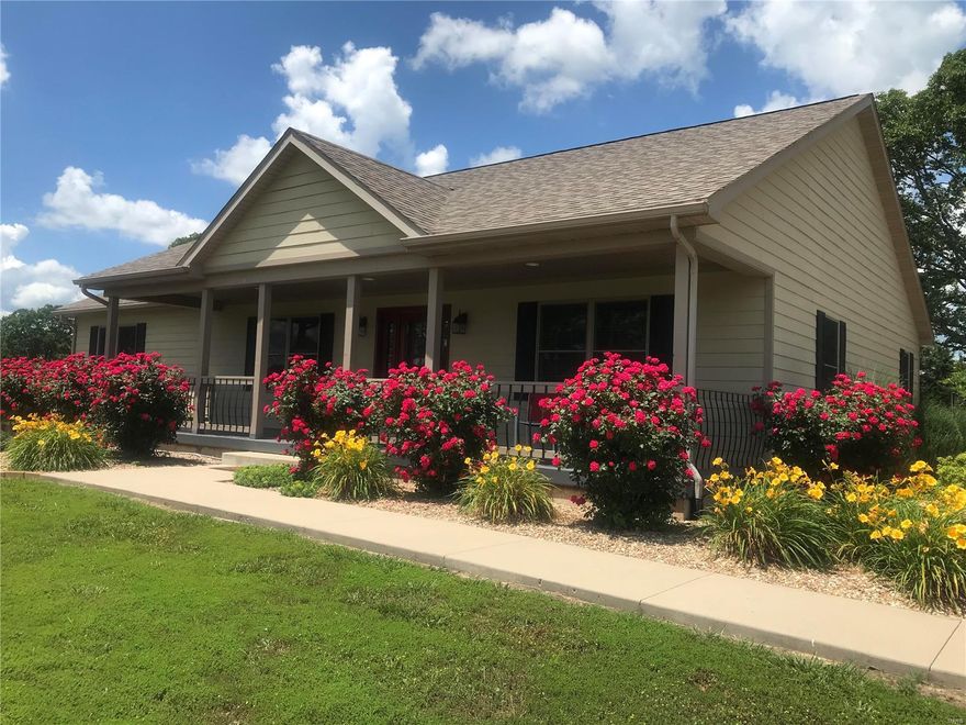 IN BEAUTIFUL BOUNTIFUL OAKS - Dream of serenity?  Here it is.  Beautiful land, beautiful views, beautiful custom built home with open, split br plan on full bsmt with lockable 37'x7'  "safe/vault room" for all your treasures.  (Great tornado shelter, too.)
Qualty built and meticulously maintained w/a huge FR/rec room for active families or hobbies & office for retirees!  It's off the kitchen and opens to the entertainment size patio with rm for your outdoor living rm.  All BR's have walk-in closets, & MBR has TWO!  The master bath has whirlpool tub + step-in shwr.  Home is efficiently heated/cooled w/heat pump except FR has its own heating/cooling unit.  Utils avg $191 yr round. Possibilities are endless in the full bsmt w/some rms framed and a bath stubbed in. Garage flr paint is heat resistant to hot tires.  Neighbor bales the hay. Bring your horses. Watch the sun go down from the lovely cov'd front porch, as you enjoy its panoramic views.  Call to see this one today.  It's a GEM!