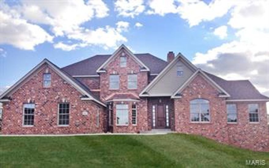 Beautiful 1.5 Story Brick Home. Brick on 3 sides, 2 masonry fireplaces, open floor plan, huge Chef's Kitchen, Stainless Steel appliances, Butler's Pantry, Custom Cabinets w/ soft close drawers, Arched openings, Beautiful view of woods and a pond, 12' Great room ceilings, Coffered ceilings at the master bedroom, vaulted ceiling at the Hearth room and Study, 8' 1st floor doors, 4 Expansive en-suite bedrooms w/ large walk-in closets, Dramatic Master bathroom w/ Whirlpool and custom master shower w/ multiple shower heads and body jets, large Laundry room w/ Laundry chute, 3 zones High efficiency HVAC, 3- High efficiency 75 gallon Hot water heaters, plenty of hardwood floors and beautiful ceramic floors and tile surrounds, 9' second story ceilings, Composite Deck on a treed/walk-out homesite.