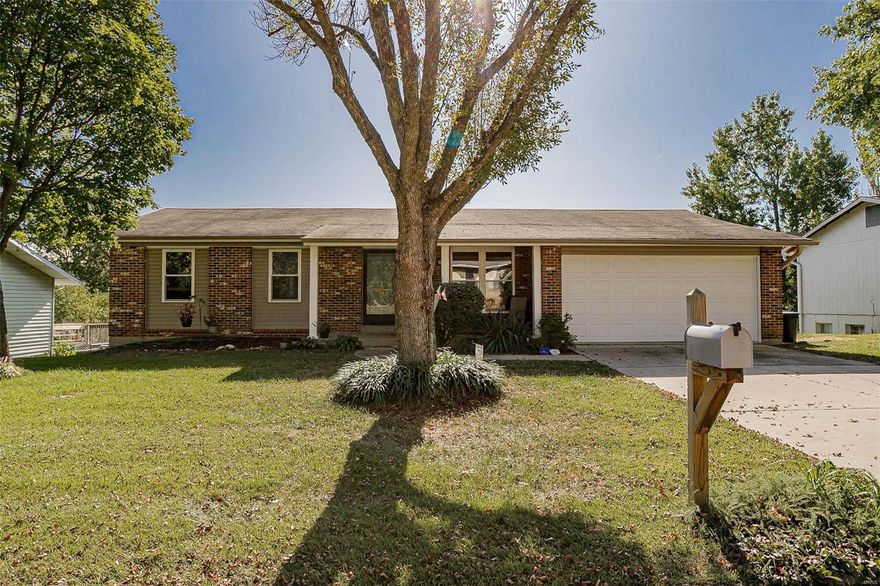 Welcome to this charming 3 bd/2ba home just off highway 30 and minutes from Gravois Bluffs shopping and restaurants.  New paint and updated hall bath.  New white 6 panel doors. Wood burning fireplace in family room.  New vinyl tilt in windows. Over-sized 2 car garage.  Entertain on your 2 decks, one off the family room thru sliding glass doors and one on the lower level around your above ground pool.  Seller offering 1 year home warranty.