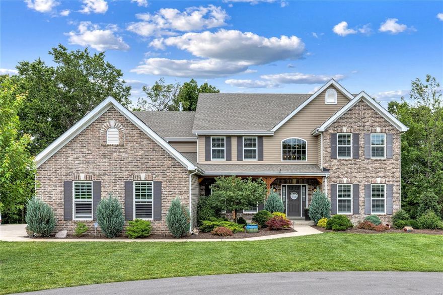 Sellers are motivated! This pristine, brick 1.5 story residence on over a private acre offers 5 bedrooms, wood floors on the top 2 floors and LV in the lower level, loads of natural light, great views, high-speed fiber optic cable, central vac, & so much more. The kitchen boasts a walk-in pantry, granite island & countertops, & stainless-steel appliances, while the adjacent great room impresses with a marble fireplace and beautiful wall of windows. The serene master suite, office/study, dining room & laundry room complete the main floor. The upper level offers a huge bonus room plus 3 bedrooms, a full hall bath & double sink Jack & Jill bath. The beautifully finished lower level includes extensive gathering/entertainment & workout space, a wet bar, bedroom, full bath & tons of storage. The outside is enhanced with attractive landscape lighting, updated landscaping, & a state-of-the-art irrigation system, all contributing to the property's exceptional appeal. A great opportunity!