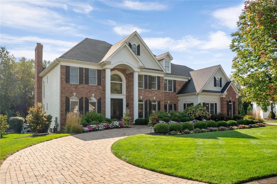 Immaculate and stately residence exudes sophistication and elegance at every turn. Boasting a crisp, clean, & stylish design, this home is a true testament to luxury living. Grand two-story entry greets you with an abundance of natural light pouring in through the large windows. The spacious great room is the breathtaking focal point of the home, perfect for hosting gatherings or simply relaxing in style. Prepare to be wowed by the large gourmet kitchen, equipped with top-of-the-line appliances & seamlessly flows into the charming hearth room. Upstairs offers an expansive primary suite with a premier, luxury bathroom. Three additional second-floor bedrooms & extra family room provide versatility & comfort. The lower level offers even more living space, featuring a fully equipped bar & recreation area, media room, & exercise room. Outside, your oasis awaits, with a sparkling pool, spa, pool bath, outdoor kitchen, and covered patio creating the perfect backdrop for outdoor gatherings.