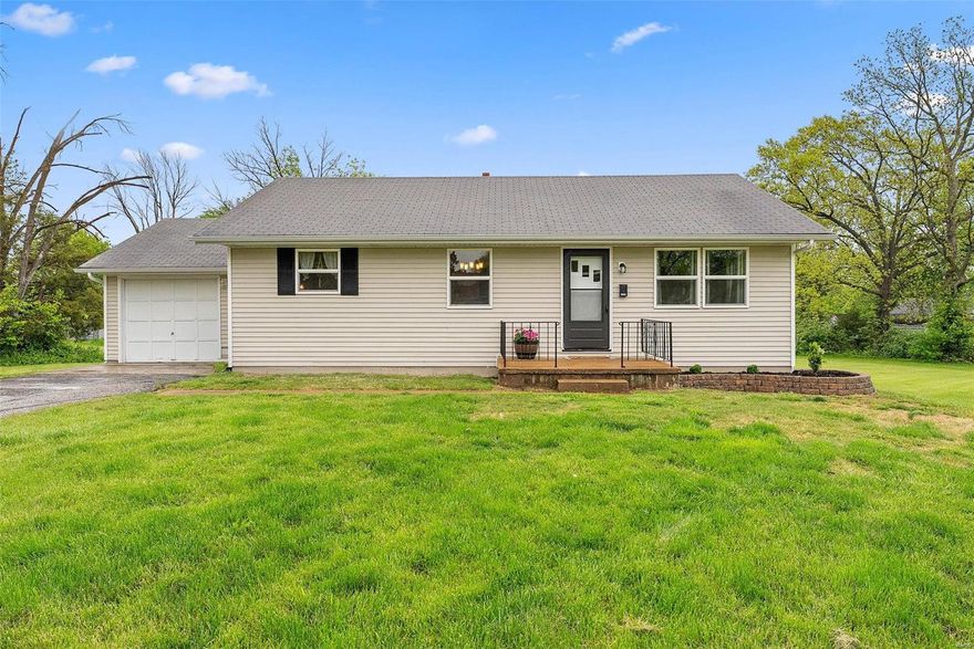 Welcome to this charming home exuding warmth and character, highlighted by picturesque arched doorways and meticulously preserved original woodwork. Boasting 2 generously sized bedrooms and a fully renovated bathroom, this home offers both comfort and convenience. Step inside to discover new carpeting, beautifully refinished hardwood floors, and luxurious vinyl tile, creating an inviting ambiance throughout. Freshly painted walls add a touch of modernity while accentuating the home's timeless appeal. Ascend the full staircase to explore the attic space, perfect for storage or potential expansion to suit your needs. Situated on a large, almost half-acre lot nestled on a quiet dead-end street, enjoy ample outdoor space for relaxation, play, and entertaining. Additionally, the home features newer siding, providing both durability and aesthetic charm. Seller offering 1 year HSA Home Warranty as a bonus! Make this your new home today before it's gone!