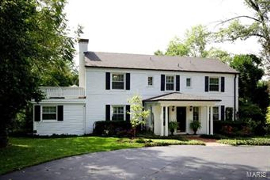Gracious two-story Colonial in the heart of Ladue with light-filled rooms and every amenity.  This house is a treat with many updates, addition and 5,000 square feet of living space.  The welcoming entry includes tons of light and two guest closets.  A large living room with gas fireplace and bookcases with multiple seating areas.  Beautiful dining room has a tray ceiling and spectacular crystal chandelier.  The updated kitchen promotes top-of-the-line appliances; Viking, Sub-Zero, and Asko.  A private patio is found between breakfast area and master suite.  A two-story family room with gas fireplace,, wet bar, bookcases and bay window, with views of covered porch, deck and pool.  The "secret" staircase leads to a private bedroom suite perfect for guests.  Included on first is a private sunny master suite, first floor laundry, and an abundance of storage.  The 2nd floor has 3 bedrooms, 2 baths and a separate nursery/office.  Many extras include security, sprinkler system, generator.
