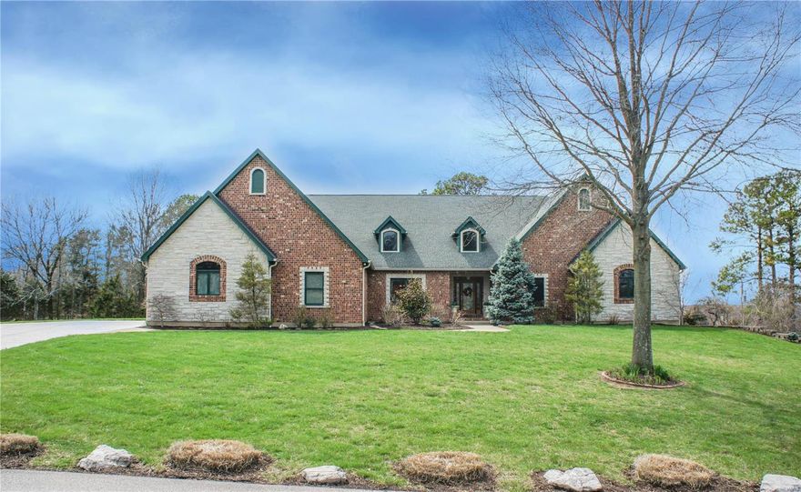 This South County home of almost 4000 square feet is a masterpiece of inspiration, craftsmanship & design. You will be stunned when you walk through the impressive 2 story entry foyer & into the dramatic 22’ vaulted ceiling Great Room with atrium windows. The natural light coming in is spectacular along with the view & full masonry brick fireplace. Nestled on 2.5 acres of land this home has been meticulously maintained inside & out. You will not find another home like this in Lindbergh Schools that has the privacy, quality construction & custom features that will leave your guests breathless. Features such as the speaker system with control panels throughout. Beam Central Vacuum with auto dustpan in kitchen. Basement has a 10' pour with 2 walk outs & geothermal heating & cooling. The porcelain flooring,the coffered ceilings,the bay windows,the skylights,the solid oak doors, everything granite counter tops & pine oak finishes throughout. Look no further. You have found your dream home.