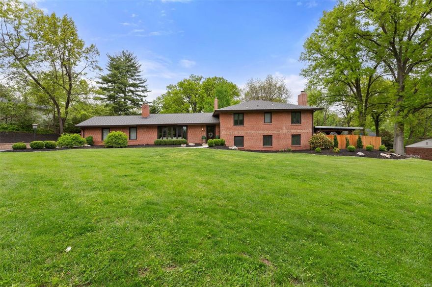Nestled on a sprawling 1.28-acre parcel in Ladue Schools, this stately all-brick multi-level home boasts a captivating open layout. Step through the formal foyer, adorned with charismatic slate tile flooring, into the expansive great room. Here, bask in great natural light from the bow window, framed by a marble surround fireplace and elegant coved ceiling. Custom kitchen, adorned with abundant 42-inch custom cabinetry, sleek granite countertops, and stainless steel appliances, Sub-Zero fridge. Adjacent, the dining area beckons with a breakfast bar and vaulted ceiling, illuminated by dual skylights. A sprawling family room awaits, boasting a second fireplace, wet bar, and atrium walk-out to the side patio. Master suite, featuring an oversized walk-in closet and a luxurious private bath with a jet tub and separate shower. Outdoor bliss awaits with a ground-level deck and patio enveloping the sizable in-ground pool. Conveniently, a 2-car rear entry garage.