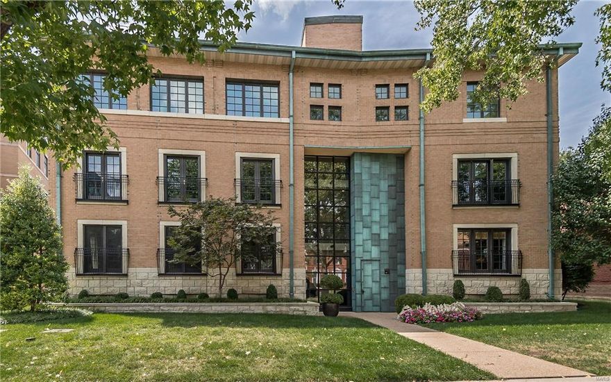 GREAT NEW PRICE! Sophisticated loft-style penthouse condominium located on one of Clayton's most sought-after streets.  This rooftop residence offers dramatic vaulted ceilings, wide plank maple flooring, granite and natural stone finishes, Kitchen with high-end appliances and wonderful open floor plan.  Huge master suite with his & her bathrooms and two large walk-in closets.  Over3,100 square feet of dramatic living space, elevator building, 2-car parking and abundant storage.  Shaw Park, restaurants, and shops are steps from your front door! Additional Rooms: Sun Room Location: Upper Level