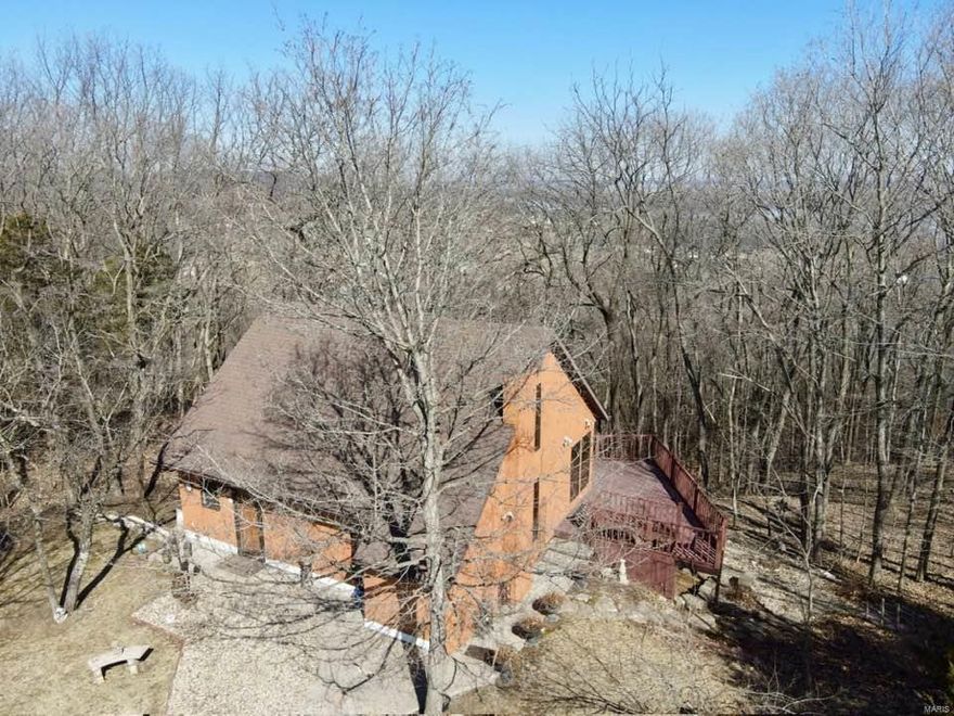 Discover unmatched privacy and scenic beauty with this 3 bed, 3 full bath home on approx. 80 acres. Enjoy sweeping river views from your own slice of paradise, accessed through a gated entrance. The spacious immaculately maintained cabin offers comfortable living and room to entertain with approx. 2,000 sq ft, while the massive 80x40 shed provides endless storage or workspace potential. Whether you're looking for a peaceful retreat, hobby farm, or recreational haven, this property delivers with views, space, and versatility.