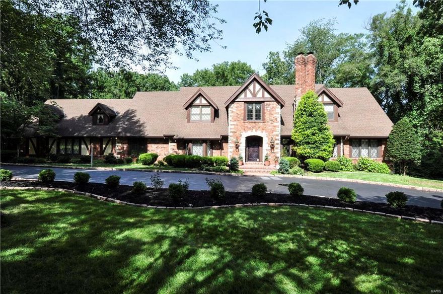 Est. 1979, Stately Elegance encompasses this One-of-a-Kind designed home by famed architect, Irwin J. Buxell Jr. Located in prestigious Ladue Lake Estates Neighborhood. 6bed/6bath 4629 sqft home situated on 1.55 acres of lush surroundings, is unsurpassed in its craftsmanship & luxury. Must see the superior finishes~Stained Glass Windows, Herringbone Floors, Antique Brass Chandeliers, Custom doorknobs, 5" crown molding, 9" baseboards, 2 Masonry Fireplaces, Kirkwood Stairs custom woodwork throughout, list is unmatched & endless! Main floor Master Suite, Great Rm w/paneled ceilings & built-in bookcases, Living Rm, Dining Rm, Chef's Kitchen, Breakfast Rm, Sun Rm, Laundry, Office/Extra Bed, 2 powder rms. 2nd Floor offer 4 beds/3 baths. Zone HVAC, 2~75gal Hot Water Htr, 9 ft pour walkout basement. Back yard perfect for a pool! Car enthusiast will appreciate the oversized 3 car attached garage+2500 sqft Carriage House large enough for a Boat, RV, or 12 Cars! Please click movie icon for video. Additional Rooms: Sun Room