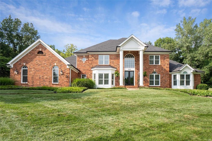 Stately 1.5 story custom build in exclusive T&C locale offers 5 bedrooms, 5 full, 2 half baths and approx. 7,000 square feet of well appointed, finished living space all nestled on a picturesque, tree lined acre lot. Light filled, two story entry welcomes with gleaming wood floors flowing throughout the main. Foyer is flanked by formal dining and executive study. Impressive two story great room has box beam ceiling and gas fireplace surrounded by floor to ceiling windows that showcase the private backyard. Gourmet kitchen includes custom cabinetry, designer backsplash, quartz counters, SS appliances and opens to the breakfast area and inviting hearth room. Spacious main floor master suite with dual WI closets and luxury ensuite bath. Up the dual staircase find a bonus loft space and 3 additional bedrooms, each with private baths. Walk out lower level is the perfect extension for living – family room, kitchen, bed and bath. MF laundry, 3 car garage, composite decks, endless upgrades!