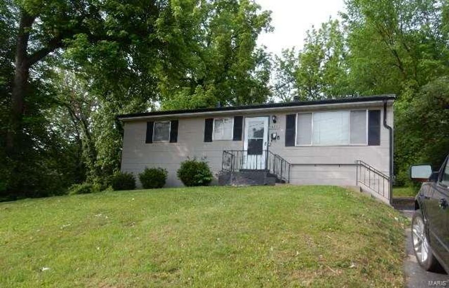 This is a 3 bedroom home with a little touch up here and there and bam! it's ready to unload some furniture and become home to someone fairly quickly.  So if you are looking to increase your portfolio, take a look, not much to do here.  There is even a detached garage in the back making it more attractive.  The location couldn't be more convenient with quick access to I-70 so you can get just about anywhere from there - University, Express Scripts, Airport, 170, downtown.