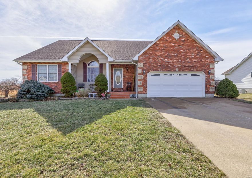 Lovely Ranch home with stunning solid hand-scraped hardwood floors, vaulted ceilings, fabulous finished basement, 3 bathrooms, 3 bedrooms on the mail level. Another room in the basement has been used for an additional bedroom. Hugh family room, game room in the basement. Small office in the lower level, along with unfinished area for storage. This home is located in a highly sought after neighborhood and is in excellent condition. Part of the deck is covered, there is a nice front porch and patio space at the walk out. The master suite has vaulted ceiling, master bath has double vanity, jetted tub, and a separate step in shower. Don't miss this one with the 2 car garage and main floor laundry.