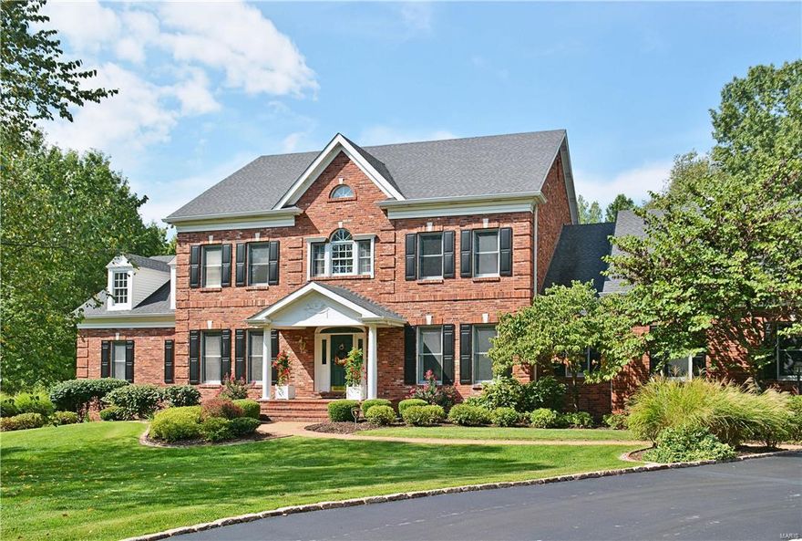 Striking brick exterior and acre of ground create high curb appeal for this custom built Frontenac 1.5 story; situated on a cul-de-sac with only 3 homes, it's a private oasis.  The home features 4 bedrooms, 6 full/2 half baths and approx 5781 sq ft of total living space.  The main floor master boasts his/hers walk-in closets & 2 master baths; one with a whirlpool tub, one with a shower.  The main level is hardwood floors; the living room has a vaulted ceiling, wet bar and Palladian windows; dining room has a tray ceiling, wainscoting & lighted built in cabinets; the large white kitchen has solid surface counters, butcher block island w/built-in wine rack & breakfast bar; separate breakfast room leads to a sunny conservatory.  There are 3 bedrooms on the second floor, all with a full en suite bath.  The LL boasts a game room w/wet bar (pool table stays) & family room with a fireplace; the room opens to the rolling back yard.  The 3+ car heated garage has an interlocking floor. BEAUTIFUL Additional Rooms: Sun Room