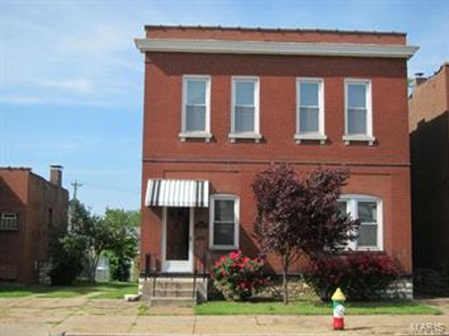 Opportunity knocks! This two family building has a lot to offer. Both units have updated kitchens and baths, plumbing, and electric. The first floor has hardwood floors through out and the second floor has carpet and ceramic tile. Newer windows and recently resurfaced roof. Each unit has it's own 12'x11' deck. The second floor deck has great city views. All this is topped off with a rare front entry drive that leads to a fantastic 4 car garage. The garage has over head doors for easy access. You need to see this one for yourself.