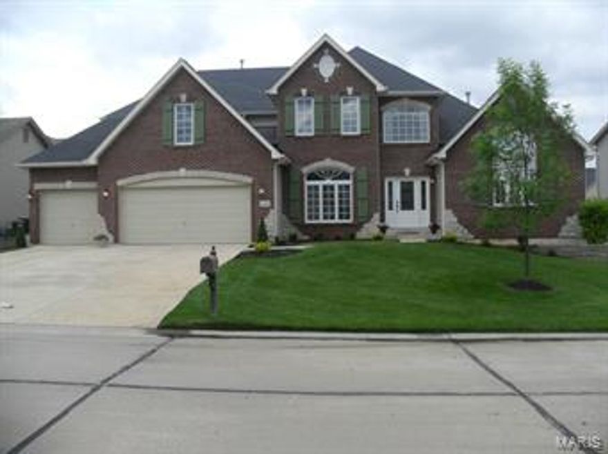 Absolutely gorgeous, designer 1.5 story, 4 bdrms, loaded with lots of amenities & upgrades.Oversize 3 c/gar Soaring 11’&9’ ceilings. Leaded Doors Welcome to this spacious foyer & grand dining room.Beautiful gleaming w/floors are present in this spacious&open floor plan Staircase features wrought iron baluster.Expansive Great Rm with stunning gas f/place accented with custom built shelving.Cooking at its best any chef's dream kitchen granite counter tops, bkfst bar, butterfly ctr/ island, upgraded 42 in staggered cabinets, crown molding & dbl ovens.Lots of crown&custom trim accents.Spacious bkfst rm & cozy hearth rm with fire/pl.Luxury Main floor m/suite, sitting rm coffered ceilings adult/ht vanity,OS garden jetted tub & sit down ceramic shower. His & er w/in closets.Upstairs 3 spacious bdrms, jack & Jill bath &bonus rm & another full bath.Beautiful Finished L/L,bed/rm bath,Rec rms. Sub/div pool upgraded lighting & carpet. Dual hvac in/grd sprinklers patio Great location close to Hwys