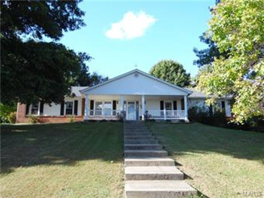 You won't want to miss this beautiful Ranch home boasting over 2050 sq ft of living space! Oversized 2 car garage and utility shed nestled on over 1 acre in Lincoln County! Amongest the rolling hills of Elsberry and just a short distance from the River! Home features a large entry foyer, formal dining room, spacious kitchen with ceramic tile, large laundry room and so much more! The living room features a gorgeous wood burning fireplace and french doors that walk out to the covered back deck! Luxury Master bedroom suite with a huge walk in close, master bath with double sinks, whirlpool tub and separate shower. A total of 3 bedrooms on the main level and that not all.... we also have a full walk out basement with a finished family room and a 3rd bath! Many upgraded features! Don't wait, call today!