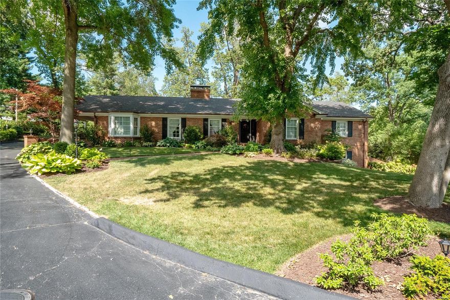 Sprawling ranch in quiet & highly sought-after Forestgreen Estates. Incredible location in Ladue School District in a private, park-like setting. Spacious entry brings you into the Formal DR & den, perfect for an office. Expansive kitchen feat. custom cabinetry & breakfast rm. Transition into the charming LR w/ gas fireplace that opens to the Huge FR with wall of windows & access to patio. Large Main Flr Primary Suite w/ lux bth feat. huge walk-in shower & walk-in closet. Two additional main flr bedrms & full hall bth. Lower level walk-out offers tremendous additional living space w/ lrge recreation rm with a wet bar, 4th bedroom, stunning full bth & half-bth. Plus lrge bonus rm & spacious laundry rm. Private yard provides ample green space surrounded by lush landscaping & an expansive patio ideal for entertaining. Two-car garage & covered side porch. Convenient location close to Country Clubs, schools, dining & shopping. This home has it all!