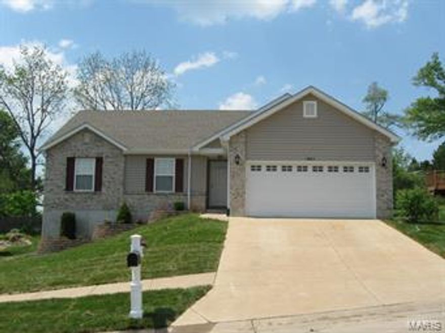 Move In Ready! Like New Ranch Home! Upgrades Galore! Features include: Kitchen w/gorgeous cherry wood cabinets, breakfast bar, pantry, stainless steel appliances including microwave, smooth top range, & dishwasher; Breakfast Rm w/Bay slider leads out to patio; Huge Great Rm w/gorgeous wood burning fireplace; Main Floor Laundry Room; Cathedral Ceiling in grt rm, kitchen, & breakfast rm; White 6 panel doors w/brushed nickel hardware; Designer lighting; Huge Master Suite w/bay window, walk in closet, cathedral ceiling, & deluxe bath w/jet tub, shower stall, & linen closet; Entry Foyer w/coat closet; Open staircase; Full basement w/rough in plumbing for bath & a look out window, just waiting to be finished; 2 Car Garage w/opener; Craftsman Style Garage door w/windows;  Attractive front elevation w/brick and vinyl siding; Pretty landscaping; Seller is providing the HSA One Year Home Warranty, too! It's perfect! Call today!!