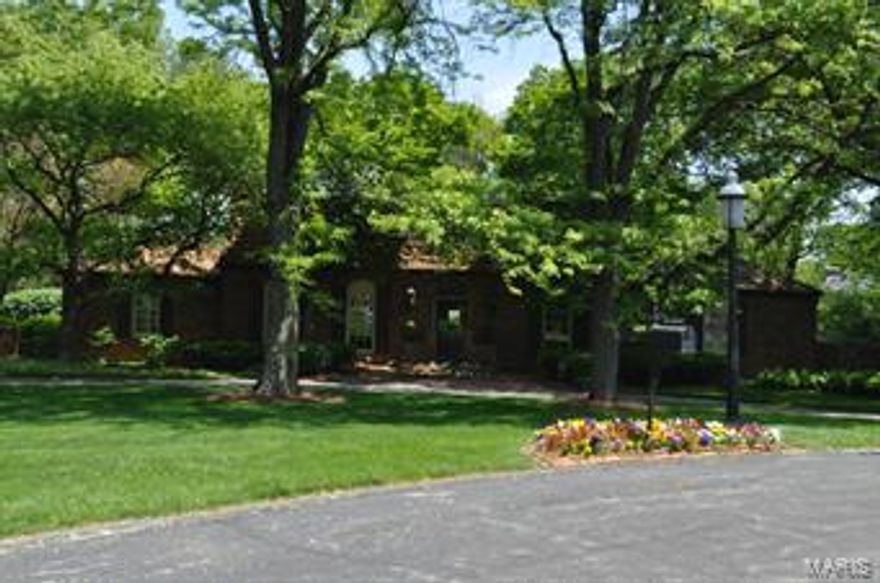 Nestled in the woods on a quiet cul-de-sac in the heart of Frontenac, this homes exterior does not prepare you for what awaits you inside. The elegant Country French 1.5-story home has been unbelievably, and lovingly, remodeled throughout with updates at almost every turn that give it sophistication & style. Spacious and charming, this home includes hardwood floors throughout, elegant, detailed molding and mill work, a two story entry, newer windows, and much more! The fabulous gourmet kitchen can accommodate a crowd & is the perfect place to gather w/ it's granite countertops, large island, and Thermador appliances. The backyard is a retreat w/the newer pool, large deck, stone fireplace, built in stone grill and flat screen tv! Remodeled baths, large upstairs bedrooms and finished LL too! This home offers approx 5400 sq ft of incomparable space! It's a true delight!  

Mounted tv in Family Room and outside included in sale. Please exclude Breakfast Room and Dining Room chandeliers Additional Rooms: Mud Room