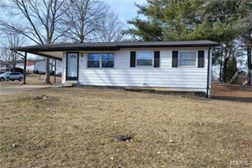 Welcome home to this move in ready home!  Easy care vinyl siding exterior.  Gleaming hardwood floors throughout the living room and all three bedrooms.  The eat-in kitchen features ceramic tile floor and back splash.  Updated lighting, ceiling fans, six panel doors and ceramic tile in the shower and floor.  Enjoy more living space in the finished lower level with recessed lighting plus there’s plenty of storage.  Updated electric with 125 amps and electronic air filter.  The yard is fenced and has a spacious utility shed and a large carport.