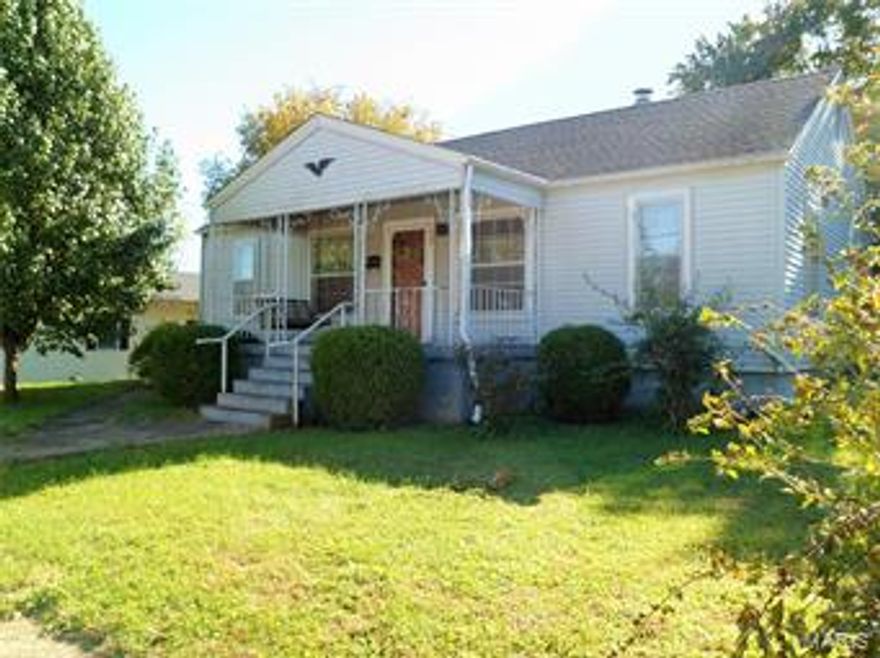Three bedroom Bungalow with original hardwood floors.  Kitchen & Bathroom have vinyl floor covering. Third bedroom has been used for utility room but could easily be converted back to bedroom.  Home has older basement for plenty of storage and utility area. This could be a good investment property or could be spruced up to live in. The refrigerator and electric range in the kitchen will go with the home when it sells,  Also  the free standing wood stove  in the dining room will be a part of the sale. Heat source is gas floor furnace.Window unit air conditioner will also go with sale.There is also a one car garage in the rear that was built in 1984. Home is priced to sell, make your appointment today.