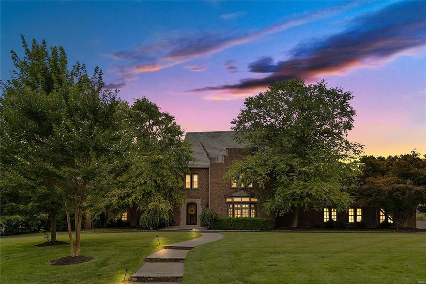 Updated elegance meets old world charm in this spectacular La Hacienda home, renovated to perfection. Ladue schools, short distance to Reed Elementary. First floor offers expansive entry hall with show-stopper staircase, generous family room with gas fireplace and built ins, formal DR, and gourmet kitchen with center island breakfast bar that walks out to spectacular private patio and backyard oasis.Second level features a spacious master suite with luxurious bathroom retreat and walk in closet, three additional bedrooms (one currently being used as an office), 1.5 updated bathrooms and laundry area.Third floor hosts a fifth bedroom, full bathroom and bonus family room with wet bar and gorgeous window seat. Fall in love with the finished basement rec room that offers rustic beamed ceiling, built in bookcase, stone FP and full bathroom. Three car garage. Fully fenced backyard, manicured patio, landscaping and sought-after circle driveway. Move in ready and will not disappoint!