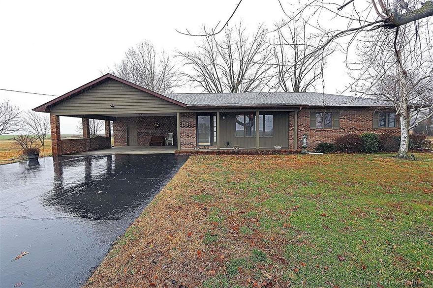 Wonderful, cozy and well cared for home with 24x36 shop on 1.16 acres just outside Advance.    The home features 3 beds, 3 baths, oversized 2 car carport, and over 2300 sq. ft. of living space all on 1 level.   The home also features a formal living room with hardwood floors and brick fireplace, master suite with a walk-in closet, a mudroom/laundry room combo, a beautiful kitchen with breakfast bar and pantry, a separate dining area and a spectacular family room with vaulted ceiling and beautiful gas fireplace.  There is ample storage and closet space throughout the home.  Other features include a 14x14 all concrete storm cellar, 12x16 deck, a covered front porch, and a 10x16 storage shed.  The 864 sq. ft. shop building has concrete floors, electricity, and water.  With so much to offer, don't let this one pass you by.