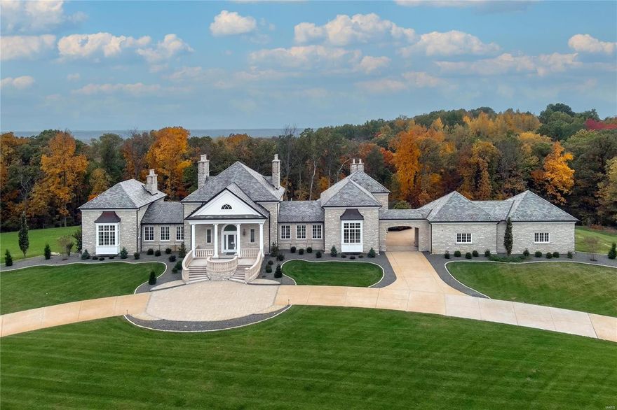 Stunning estate home perfectly sited on a premium 4+ acre setting, located in a gated enclave within Whitmoor Country Club grounds. Quality materials & craftsmanship are showcased inside & out. Limestone exterior, fine architectural detailing, premium slate roof, copper gutters, columns and stone balustrades are all testaments to the fine construction & design. The impressive Foyer opens to the beautifully proportioned Great Room featuring 2 fireplaces, a deeply coffered ceiling, multiple French doors to the rear veranda overlooking a fountain, expansive grounds & woods. The home features 10 masonry fireplaces & too many rooms & amenities to list. Main Kitchen, Catering Kitchen, Octagonal Breakfast Rm & Hearth Rm share an open plan. Luxurious Primary Suite & paneled Study. Newer elevator connects all levels including a step free exterior entrance to access 4 car garage. 3 Bedroom Suites, Rec Rm, Wet Bar, Wine Cellar, Utility/Hobby, complete the LL. Truly an exceptional property! Additional Rooms: Wine Cellar