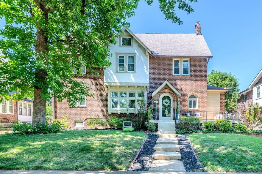 Exquisite classic 3 story Tudor home, 4 bd, 2.5 ba, NEW AC, w/2 car detached garage on quiet, tree-lined street in Moorlands subdivision. Attractive porch & underground sprinklers front/back yard. Elegant arched door brings you into formal dining area, huge & full of natural sunlight. Arched doorways & windows add charm, & gorgeous wood flooring. Living room has attractive focal point of the brick fireplace w/set of arched french doors that lead to the study area. Eat-in Kitchen has everything at your fingertips, an abundance of bright white cabinetry, SS appliances, wine cooler, double oven, & tile backsplash. Come to the UL to relax where you will find 3 bds. w/large closets. Large ba has double sinks & cabinets for storage of linens & organizing. Step up to Master level, huge open space w/separate zone AC unit. Master ba has laundry, jetted tub & separate shower. LL ha open space, half ba & laundry area. Backyard has flower beds, in ground pond w/waterfall feature & all brick patio.