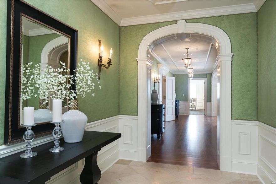 This gorgeous 2 bedroom, 2 1/2 bath luxury condominium is a special treat! From the 19th floor, the southeastern exposure provides spectacular views overlooking the treetops of Clayton to the Arch and downtown skyline.  Substantial millwork and custom finishes throughout make this gracious unit one of a kind. The lovely, formal rooms and cozy, wood paneled den with a gas fireplace create fabulous spaces for entertaining family and friends. The large, chef's kitchen is a delight with custom cabinetry, granite counter tops, top of the line appliances and a cheery breakfast room.  The private master suite includes a lovely sitting room, fabulous bath, large, walk-in closet and a back hallway lined with closets and built in cabinetry and bookcases for all of your storage needs. A guest bedroom with a private bath on the opposite end of the unit completes the package.  With the incredible amenities of the Plaza, this elegant condo offers luxury living at its finest. Location: Suburban