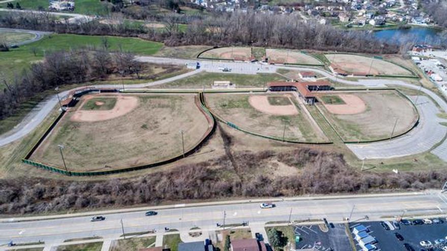 Play ball! Calling all youth sports organizations. Great opportunity to operate 6 baseball fields for tournaments, leagues, and training. All fields have dugouts, covered bleachers, and backstops. 17 years remaining on ground lease. Landlord is Francis Howell school district. Approx 240 parking spots. All outdoor lighting in place. Huge covered, viewing deck. Wheelchair accessible. 2 concessions stands. Maintenance shed with lawn equipment. Convenient st Charles location off Hwy 364/Page extension.   
Don't wait til the bottom of the 9th to catch this opportunity! Location: Other