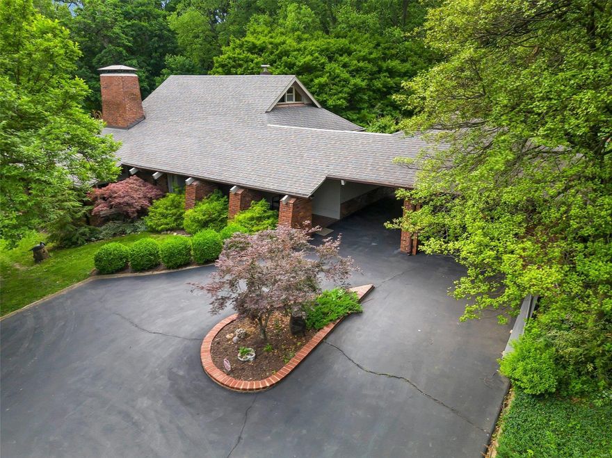 SPECTACULAR mid century multi level home on a gorgeous lot that is just under 2 acres.  This home has been beautifully renovated from top to bottom, with the utmost attention to detail.  From the pizza oven in the kitchen to the large pool to the boat dock....this home is ready for family gatherings and entertaining friends! Granite countertops, stainless appliances, new flooring, lighting, HVAC....the list goes on and on.  Schedule a tour and see all of the upgrades and love that has been put into this house....you will not be disappointed!  Homes in this exclusive subdivision just don't come up very often, especially move in ready!!  Don't miss out on your chance to live like you're on vacation, every day. Virtual Tour: https://my.matterport.com/show/?m=EAsL63dBmu3&brand=0&mls=1&