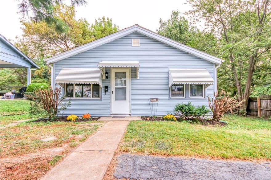 Don't miss this absolutely adorable home!  There are 2 good sized bedrooms,  The home has been very well maintained with lots of updates being done through the past several years including the roof,, furnace, dishwasher and garbage disposal. New kitchen flooring and white cabinets make the kitchen a joy.  The sellers say even the refrigerator can stay! The sunroom lets in lots of light and has a perfect view of the level, fenced backyard.   The swingset can stay or be removed.  Full walk out basement Additional Rooms: Sun Room