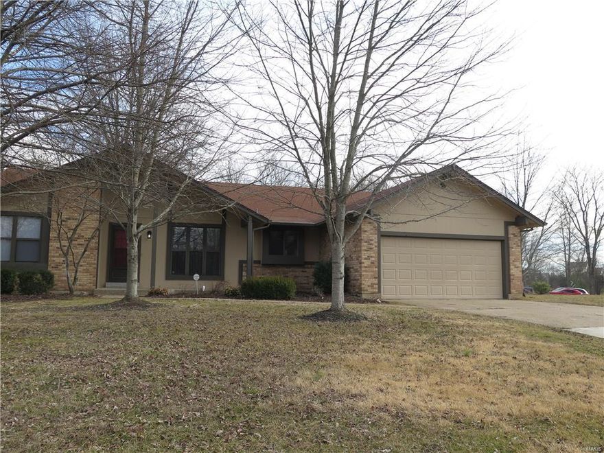 Spacious ranch home with attached two car garage. Beautifully updated kitchen with stainless steel appliances, granite counter tops, a breakfast island & dark stained, maple cabinets. Gorgeous wide plank, maple hardwood flooring. Custom master bath with a tiled shower with accent tile and a separate soaking tub with skylight. Very open ranch floor plan with vaults in the family room, kitchen and master bedroom. Basement is finished with new carpet in the family room and extra room could be used as a den or study. The house has been extensively remodeled. New kitchen, updated baths, new flooring & updated basement finish. Heat and air was replaced to 2 to 3 years ago. The exterior has been painted and there is a new large concrete patio in the back. This house has a large lot with mature trees and nice landscaping. The house has full rights to use the private largest lake in the metropolitan area, so bring your boat and water skis. The big lake is just a short drive from the property!