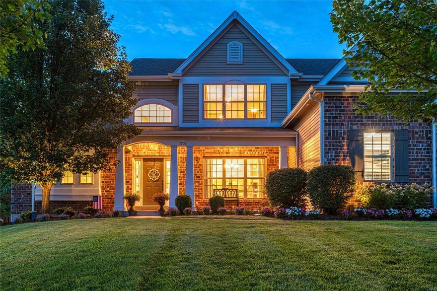 This spectacular 1.5 Sty from Prestige Custom Homes features over 5500 sf of living space enhanced by vaulted ceilings, extensive millwork & oak hardwoods.  Situated on one of the largest lots in desirable Harwood Hills. Impressive 2-sty foyer leads to formal dining room with arched entryways & stunning great room with dimensional ceiling & marble fireplace. Spacious open kitchen with granite countertops, 42” cabinetry, KitchenAid appliances & butler’s pantry adjoins light-filled breakfast room & hearth room with wall of windows & floor-to-ceiling stone fireplace. Main floor master bedroom suite offers a relaxing retreat with 2 customized walk-in closets & luxury bath. The 2nd floor extends the living quarters with 3 additional bedrooms, 1 with ensuite bath & 2 with Jack n’ Jill bath, plus bonus room. Builder-finished Lower Level includes expansive recreation room with entertainment center & wet bar, 5th bedroom & full bath. Premium .5-ac lot with patio, fenced backyard & 3-car garage.