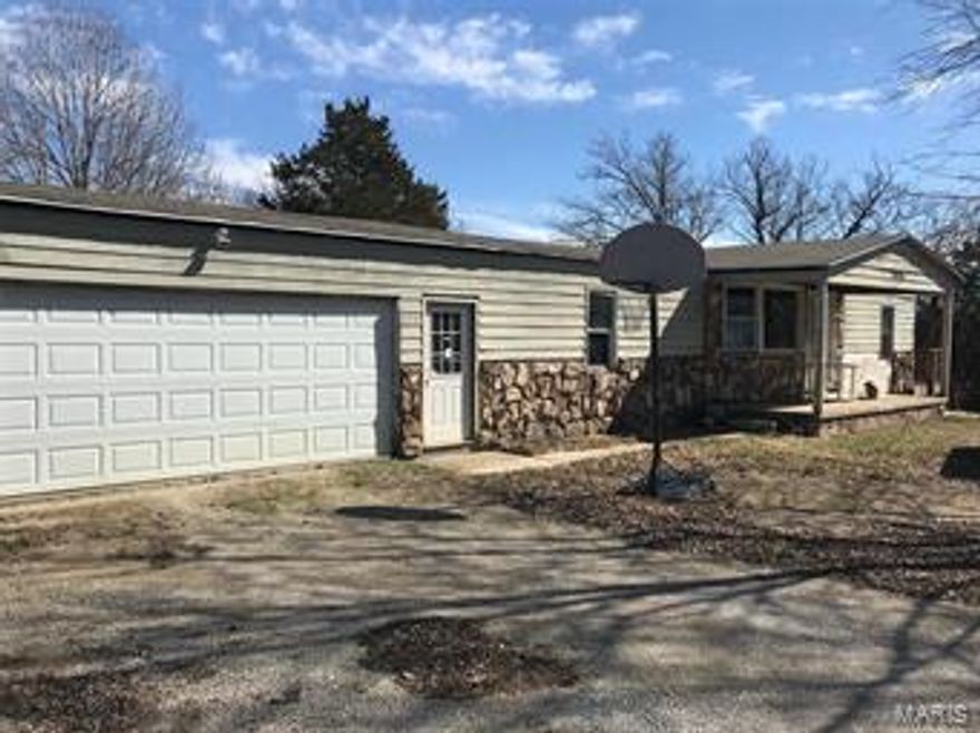 Located on a dead-end street, this  manufactured home is in need of TLC or you may even want to remove and rebuild on the full basement foundation.  It offers 1152 sf of living area including 3 bedrooms and 2 full baths. The home has a 2 car attached garage and separate 2 car detached garage.  The property has a large and private lot. SpecialListingConditions: Foreclosure