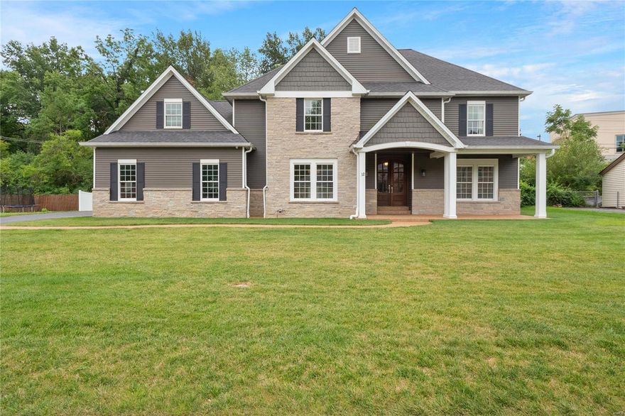 This exquisite newer construction gem is located in the highly sought-after Ladue School District. As you step inside this home with over 4,300 sq. ft. of living space, you will be captivated by the 9’ ceilings and open floor plan flooded with natural light from the abundance of windows. The heart of the home, the kitchen, boasts white cabinetry, quartz counters and an adjoining informal dining area. The family room off of the kitchen, has a cozy fireplace and built-ins. A gracious dining room & den/office span the front of the home. Main floor laundry. Upstairs you'll find the primary suite with a spacious en-suite bathroom boasting a massive walk-in shower, a soaking tub, dual vanities & a generously sized walk-in closet. The 2nd level offers 3 additional bedrooms, 2 bathrooms, a laundry area & a bonus rec room. Lower level with 9’ pour,  recreation room & 5th bedroom with full bath & abundant storage. Level, partially fenced backyard with patio. Oversized 3-car garage.