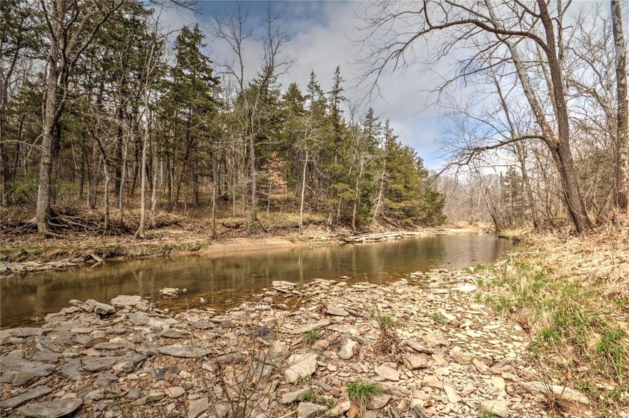 This is a beautiful recreational farm with lots of potential! 260 Acres m/l in east central Callaway County, MO and minutes from the historic, Crane's Country Store! This farm is located a short distance from I-70 and offers the privacy of a dead-end county road. When you arrive, you'll feel like you've stepped back in time to the "old homestead" with the farmhouse and large gambrel roof barn that would make an awesome base camp! This wildlife haven boasts 50 Acres m/l of cropland, additional acreage of expired CRP fields, with the balance in large timber with cedar thickets. The farm has beautiful vistas overlooking Harrison Branch and hidden meadows and food plots for the turkeys to strut! County water, electric, and county road frontage gives this farm a head start with building your weekend cabin or permanent home.