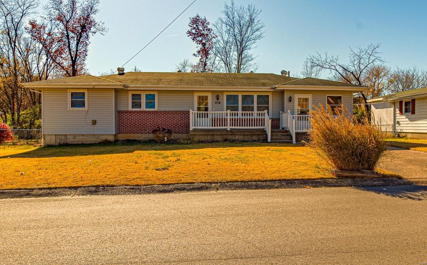Very nice 3 bedroom 2 bathroom with all the charm and character of a 1960's home. Big windows, built in bookcases, large living room and dining room/ sunroom fill this home with tons of light. Downstairs is all set up for sleeping area and additional rec room and bedrooms and except for carpet being laid it's fully finished. Beautiful wood and tile floors throughout are perfect for pets! Located in 100 year flood plain. Sellers pay $400 a year for flood insurance. Large deck out front and fully fenced large yard in back with sidewalks and a shed. Galley style kitchen has white appliances. Just cute as can be! Schedule a showing soon! Additional Rooms: Sun Room