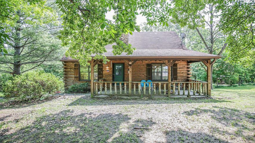 Perfect starter home, the cutest log cabin bungalow just on the outskirts of town.  So much work has been done, New Flooring, Some new windows and blinds, new stove, new deck, and soooooooooo much more!  Some TLC items are left to do but with a little sweat equity this home will be the gem you have been waiting for.   The front porch is the perfect spot to relax after your hard working day,  come on in to a cozy open floor plan with vaulted ceilings and a  rustic homey feel.  Two main floor bedrooms and a bathroom are right down the hall,  upstairs is a loft with so many possible uses and it overlooks the main level.  The full basement is a walk out and has another bathroom (that needs finishing).  Plenty of storage space and also possibilites tha are endless.   Outside is a nice workshop and more storage.  All of this right off Hwy 110 and Hwy 67 but not in a subdivision.   Come check this one out!  Selling AS IS.