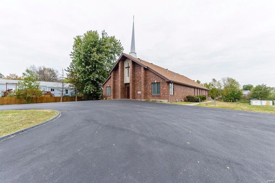 Located on Hwy K with access to Hwys 64 and 40, this 8800 sq ft church is ready for your congregation to move into. This well maintained Church has a Beautiful Sanctuary with soaring ceilings, baptismal with changing rooms, sound board, Flat screen TVs, and 8 large classrooms. Sanctuary seats approx 130 people with a raised stage,and walk in baptismal behind front wall. Large Fellowship hall with easy kitchen access for congregation meals or brunch. Spacious kitchen offers two stoves, microwave, sink, icemaker, coffee maker, and refrigerator. Additional personal property includes a large storage shed. Beautiful 2.89 acre lot offers tons of room for future expansion! Zoned for church, may have options for commercial zoning. Location: High Traffic, Hwy/Interstate Frntg