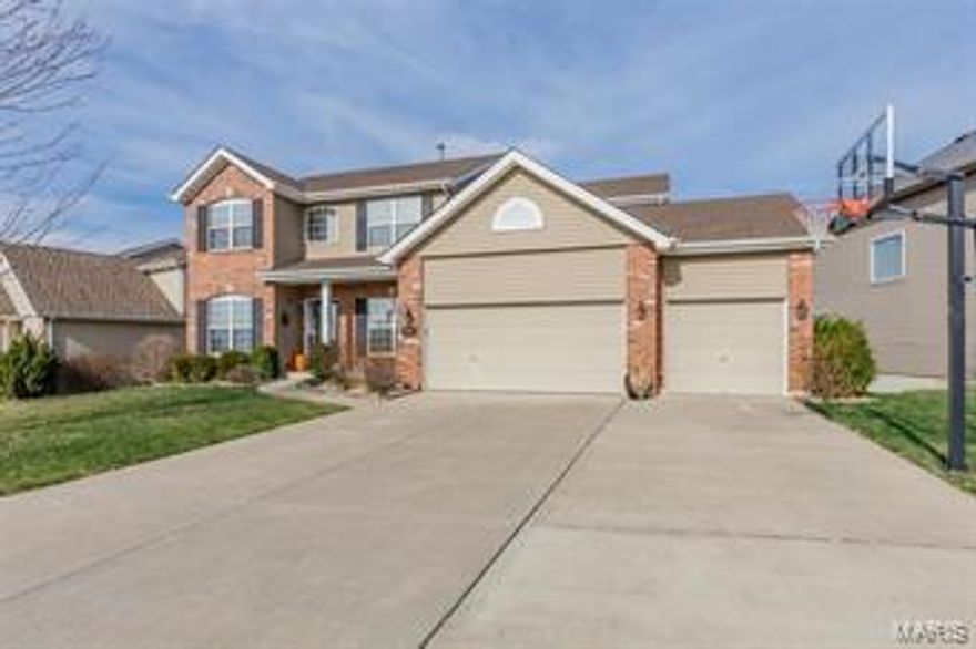 Absolutely remarkable 2-sty home in the Mirasol Community! Pride of ownership is evident as soon as you pull in the driveway. Curb appeal is A+ w/brick accents, premium lot, 3-car garage w/extended bay & more! Walk inside to gorgeous, wood laminate flooring, plantation shutters, updated fixtures & neutral paint. Formal DR is accented w/wainscoting & flanked by living room that doubles as a home office. Family room is improved w/bay windows, gas FP & built in shelving. Gourmet, eat-in kitchen provides tons of counter space, 42 in cabinets, butler pantry, bar area, center island & ceramic tile floor. Upstairs you'll find a master BR suite w/vaulted ceilings, huge walk in closet & full master bath w/dual vanity & corner tub. 3 additional bedrooms on the 2nd level share a full bath. Fully finished, W/O LL is awesome w/5th bedroom, full bath, 9 ft pour, wet bar, rec room & bonus area. Out back you'll find a maintenance free composite deck, large flat yard & concrete patio. Rockwood Schools.