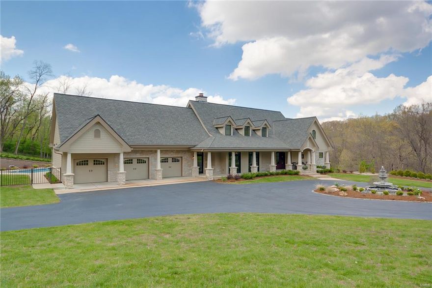 Luxury property on private lot in Lindbergh schools! Custom masterpiece built to impress on 2.65 acres in Sunset Hills with unbelievable upgrades. Sellers attention to detail in designing this home ensured that it is not only luxurious, but also functional and efficient. It is nestled in a serene park-like setting with an abundance of wildlife and picturesque views. A heated pool with retractable cover, stunning outdoor fire place on covered patio with remote phantom screens creates an entertainers delight.  The kitchen boasts top of the line Viking appliances, 3 ovens, 2 warming drawers, 2 dish washers, gas range/hood, crumb catcher/central vac, butler pantry, custom cabinetry, & center island. Zoned HVAC w remote access independent room climate control.All bedrooms are designed as suites including California closet built ins and deluxe steam shower and bidet in master.  50 year architectural roof, 600 amp electric service, (2)75 gallon Hot water heaters, security cameras and more!