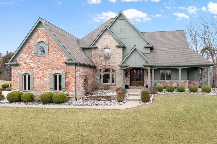 Look no further! This custom-built 1.5 story sits on a beautiful 5 acre lot with an inground pool and tons of privacy. Quality finishes throughout! Custom mahogany front door and 2 story entry with a sweeping staircase and tile floors. Formal dining rm with crown molding. Incredible 2 story great rm with a stone fireplace, custom windows, and millwork. The lovely kitchen boast custom cabinets, a center island with a breakfast bar, built-in refrigerator, Wolf gas range, beverage chiller, an adjoining breakfast rm and vaulted hearth rm with a fireplace and built-ins. ML master suite with 2 walk-in closets and full luxury bath with double vanities, jetted tub and walk-in shower. 3 additional bedrms, 3 full baths and a bonus rm on the UL. The walk-out LL, with roughed in plumbing, is ready for your finishing touches. Additional features include ML laundry, 2 ML half baths, composite decking, patios, level yard space, 3 car side entry garage and much more. Absolutely charming!