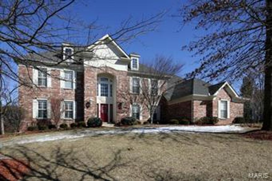 Updates galore in this amazing 2 story located in sought after Country Lake Estates in Chesterfield. Completely remodeled gourmet kitchen with 42 inch cabinets, quartz counter tops, GE Profile stainless steel appliances, tiled backslash, 2 sinks, oversized island, pull out drawers with soft close cabinets. Spacious hearth room with vaulted ceiling and gas fireplace. Upper level features master suite with coffered ceiling, his and her vanities, Jacuzzi tub and large walk in closet with organizers. 3 additional bedrooms complete the second floor and each bedroom has it's own bathroom. The walk out lower level has 2 additional bedrooms, 2 full baths, exercise room/possible media room, walk behind wet bar, rec room and family room. Backyard has spacious deck leading to inground heated pool and level lot. Additional features include plantation shutters throughout, wood floors, newer carpet, updated fixtures and 3 car side entry garage.