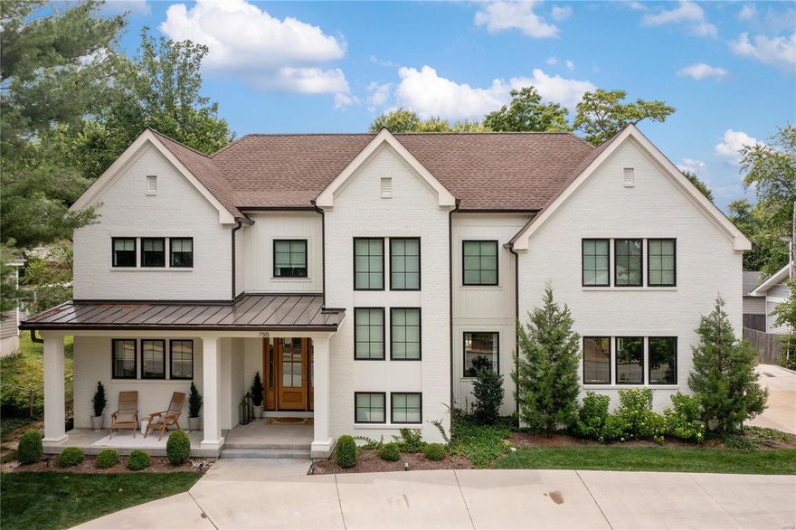 755 N. Woodlawn Ave is a one of a kind property; a true forever home right in the heart of Kirkwood.  This NJL Custom Home built in 2020, which is a featured property for Pottery Barn, has a timeless + functional architectural design highlighted w/ black pane windows, creamy white paint color + light wood finishes throughout. The outdoor living space sends vaca home vibes w/ pool house, stone pool deck + covered porch for poolside gatherings.  Gracious main floor open concept ties kitchen, dining + family spaces all together.  The prep kitchen is a chef's dream offering endless storage/ pantry, counter space + farmhouse sink. The 2nd story has 3 bedroom suites + spacious laundry rm.  The primary is a private oasis w/ spa bath ~ dbl vanities, soaker tub, shower + walk-in closet w/ built-in cabinetry, dressing table + seating area.  Finished lower level has 2 add'l bedrooms, full bath + family rm. A beautiful circle drive for easy access to 3-car garage space.  Award-winning Kirkwood SD. Additional Rooms: Mud Room
