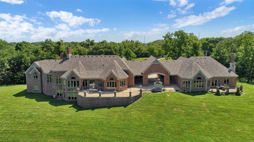 Tucked up high above the hills above St Albans Valley and eastern Franklin County lies this private retreat w 108 acres of unmatched quality. This view will stun you and you'll feel literally on top the world!There are 2 homes on this estate connected through a breezeway with sweeping large patio for this fresh air and views of the eagles flying high. This property is in unincorporated Franklin County and has no restrictions. Primary home is an atrium ranch w tons of windows and well thought out space. Many custom features here with built ins, natural stone counters, library, office plus huge Cathedral ceilings in great room. The secondary home is charming with this same quality, nice private patio and 3 car garage! There is a private lake w stone patio and gazebo, many hiking trails all over this 108 acres. In addition, there is a workshop extra 4 car garage with patio and fireplace for those cars, motorcycles, or hobbies. Road being paved in June . One of a kind property here.