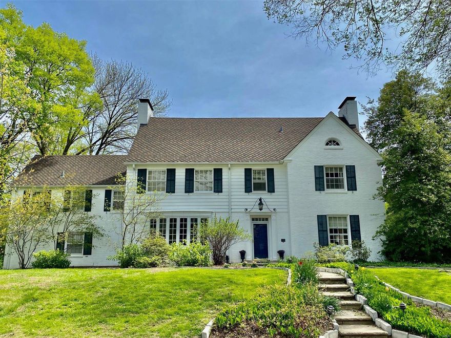 Picture perfect curb appeal and a gracious entry hall will welcome you with bright light and views straight through to the backyard patio- this home is oozing with charm from top to bottom! Large windows, hardwood floors, built-in bookshelves and beautiful moldings. Expansive first floor offers wonderful LR with wood burning FP and large DR with large bay window. Kitchen opens to bright 4 seasons room with walkout to newly remodeled pool, patio, and private yard. Second floor boasts master suite with updated Carrara marble bathroom, 4 additional bedrooms, and 2 additional full bathrooms. Bonus family rec room with FP in the basement, and 3 car rear entry garage. Old world charm yet updated and relaxed, wonderful family living, this happy home is move-in ready! Clayton Schools.