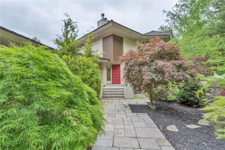 This Contemporary home has over 6,000 sf. of living space, w/an open spacious bright floor plan! Located in a private setting with amazing views overlooking the trees and hills of Chesterfield. Windows along the south-facing side of the home overlook the amazing pool with an infinity edge, fire pit patio area perfect for entertaining. The living room and dining room are perfect for elegant or casual entertaining. Top notch designer kitchen features granite counter tops, high-end appliances, huge walk-in pantry, large breakfast room which opens to the Hearth Room with a fireplace. Lots of custom built in cabinetry throughout. The private master bedroom suite has a luxurious master bathroom with a huge walk-in closet. The lower level features a recreation room with a wet bar, 2 bedrooms with 2 private adjoining bathrooms, walk out to the pool area and sunroom! 3-car garage located on 2.15 acres of beautiful grounds. Located in Rockwood School District! Close to shopping and hwy access! Additional Rooms: Sun Room