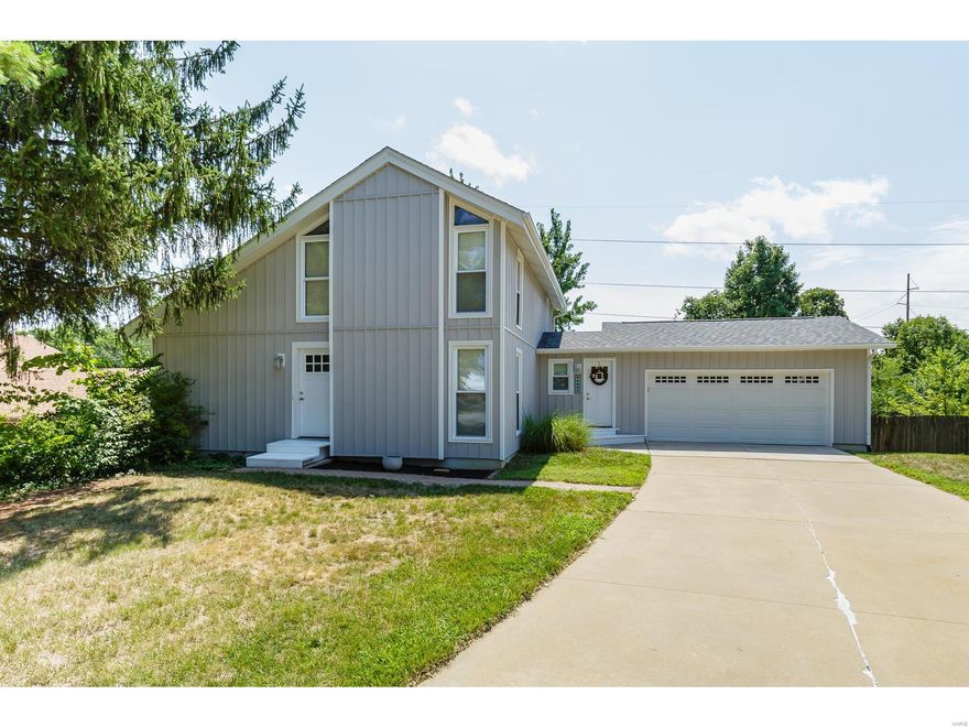 10K REDUCTION! Rare Opportunity to find a Unique Updated One of a Kind 1.5 Story Home. The Moment you Pull into the Driveway you will notice the Beautiful Vertical Siding, New Architectural Roof 2017 & Updated Windows. Inside, an Open Floor Plan w/a 2 Sty Great Rm-Dining Rm Combination. Cozy Fireplace & Beautiful Wood Floors. The Open Staircase takes you to the Catwalk across the Top that leads you to a Vaulted Master Bedroom & the Vaulted 3rd Bedrm with an Updated Bath Between w/Adult Height Vanity & Custom Tiled Shower. The Walk Out Lower Level has some finishes Drywall & Electric BUT is awaiting your final touches. Main Floor Laundry, Spacious 2 car Oversize Garage, Eat In Kitchen Features Crown Molding over the Cabinets, Stainless Steel Appliances, Built In Microwave, Mosaic & Tile Backsplash & Alcove for your Bills & Recipes. All New 4 inch Baseboards, 6 Panel Doors, Main Floor Laundry, Fenced Yard, Enclosed Soffits & Fascia, Deck w/Some Composite Boards, Backs to Towering Trees.
