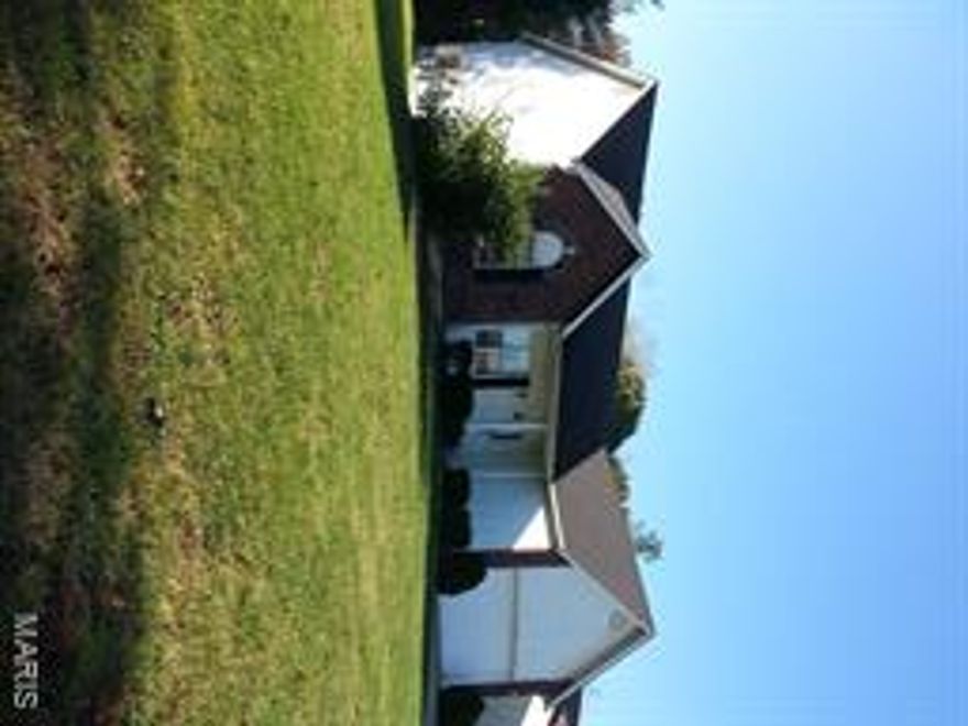 Don't miss out on this spacious 3 bedroom, 2.0 bath home with great curb appeal. You will love the hardwood laminate floor in the whole house except in the kitchen, and the separate, formal dining room, perfect for the upcoming holiday entertaining. The chef in your family will love the large, open kitchen with lots of cabinet and counter space for preparing meals.